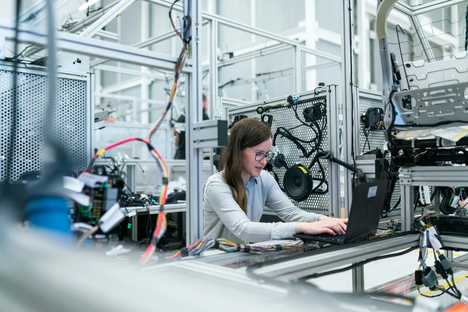 Engineer reviewing automated systems on a tablet