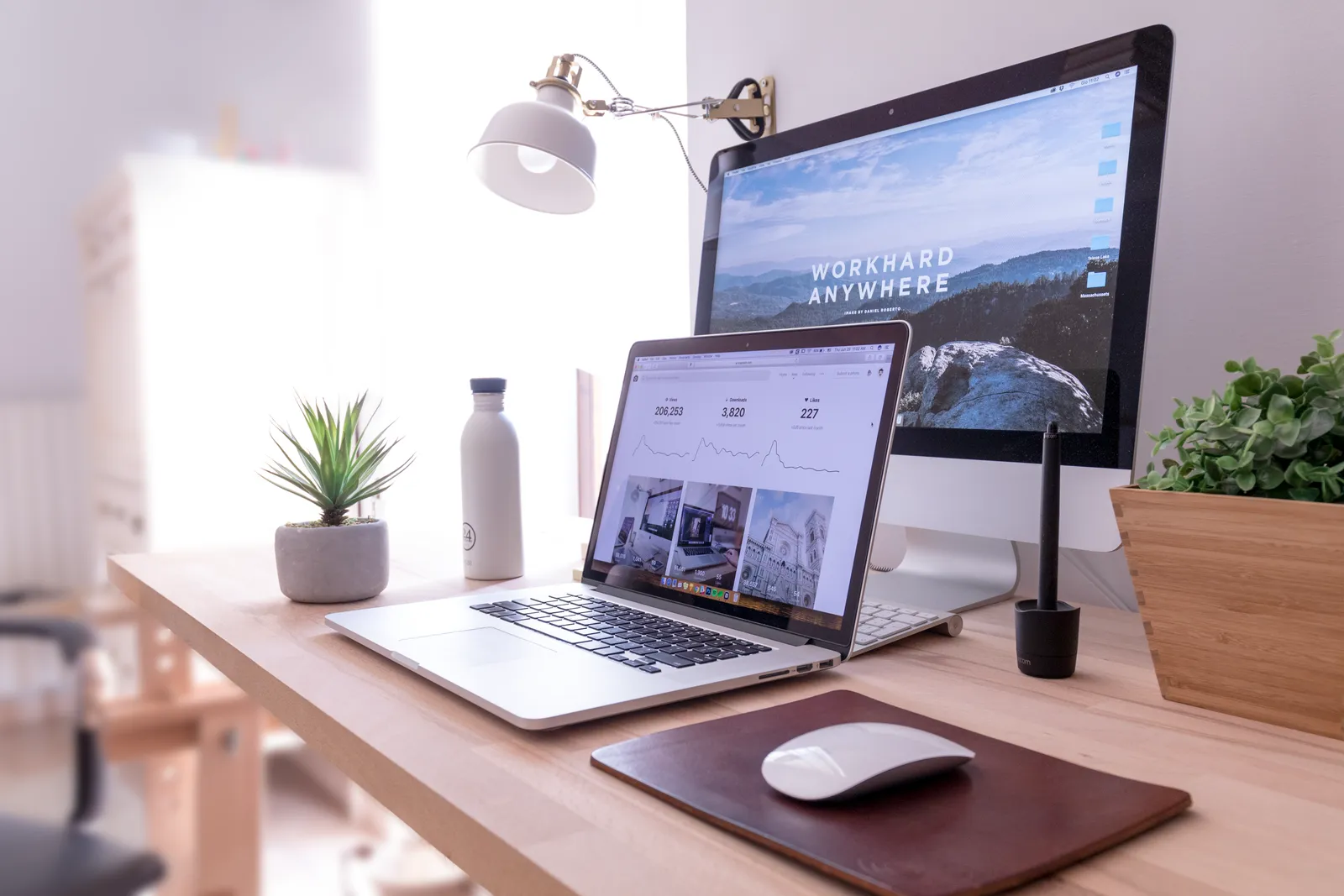 Laptop on a clean desk running a content management screen